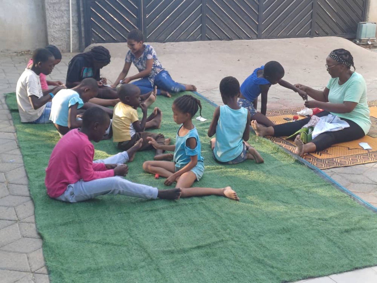 Children participating in a group development activity